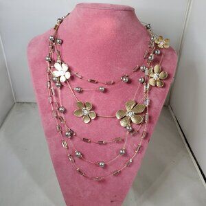 Ali Khan gold-toned multi-strand necklace featuring six layers